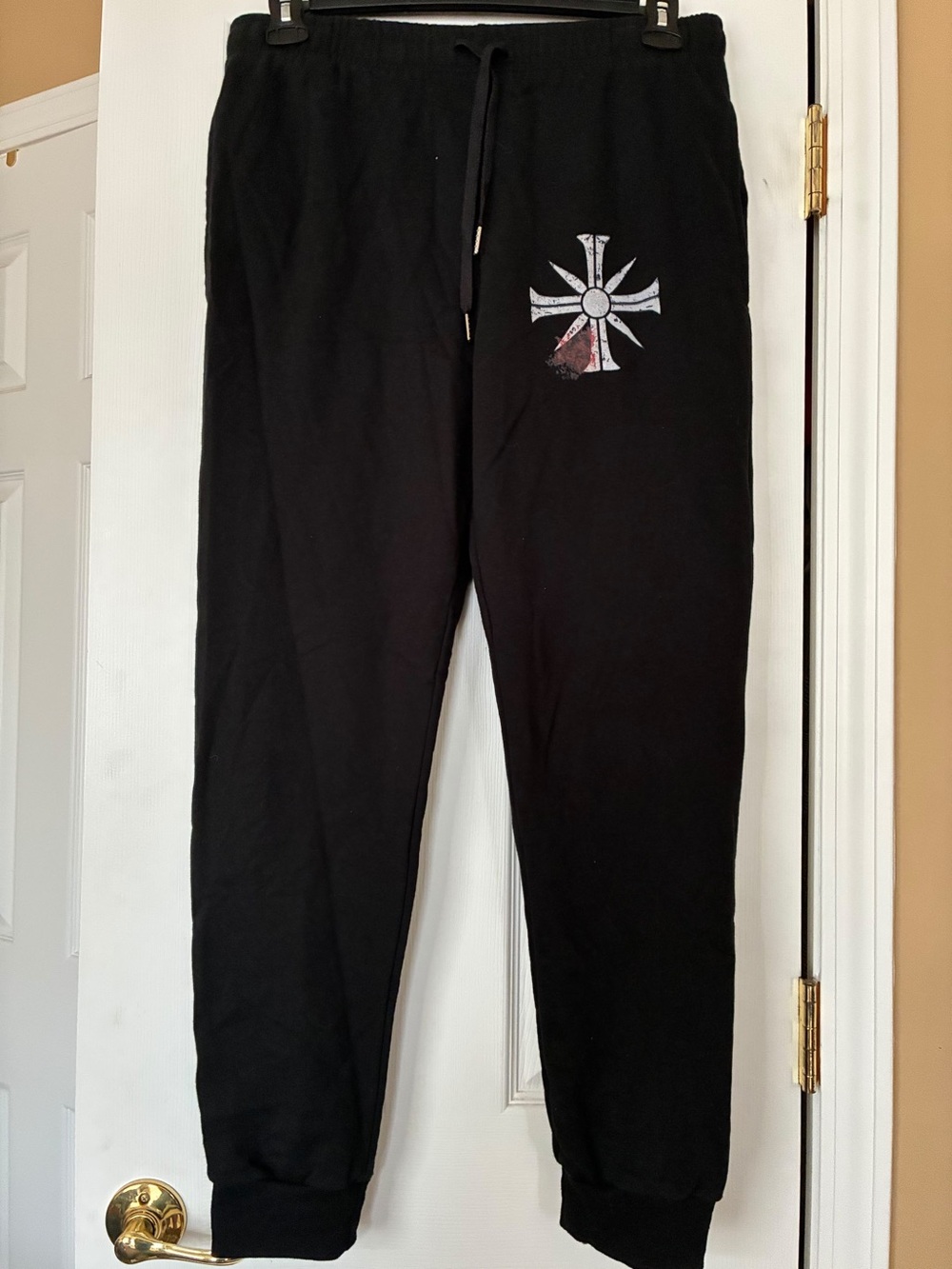 Black Jogger Sweatpants with Subtle Cross Accent